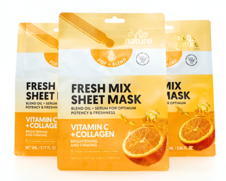 Two Fresh Sheet Mask packages with orange slices on a white background