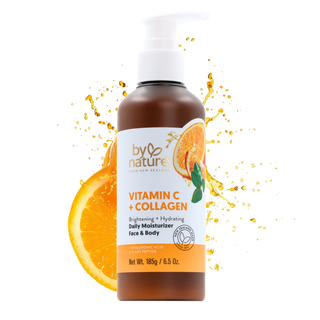 Bottle of 'By Nature' Vitamin C + Collagen daily moisturizer with an orange slice and droplets on a white background