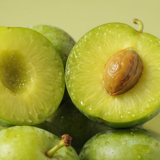 Close-up of fresh Kakadu plums, a natural source of Vitamin C, used in By Nature Vitamin C + Collagen Face Serum.